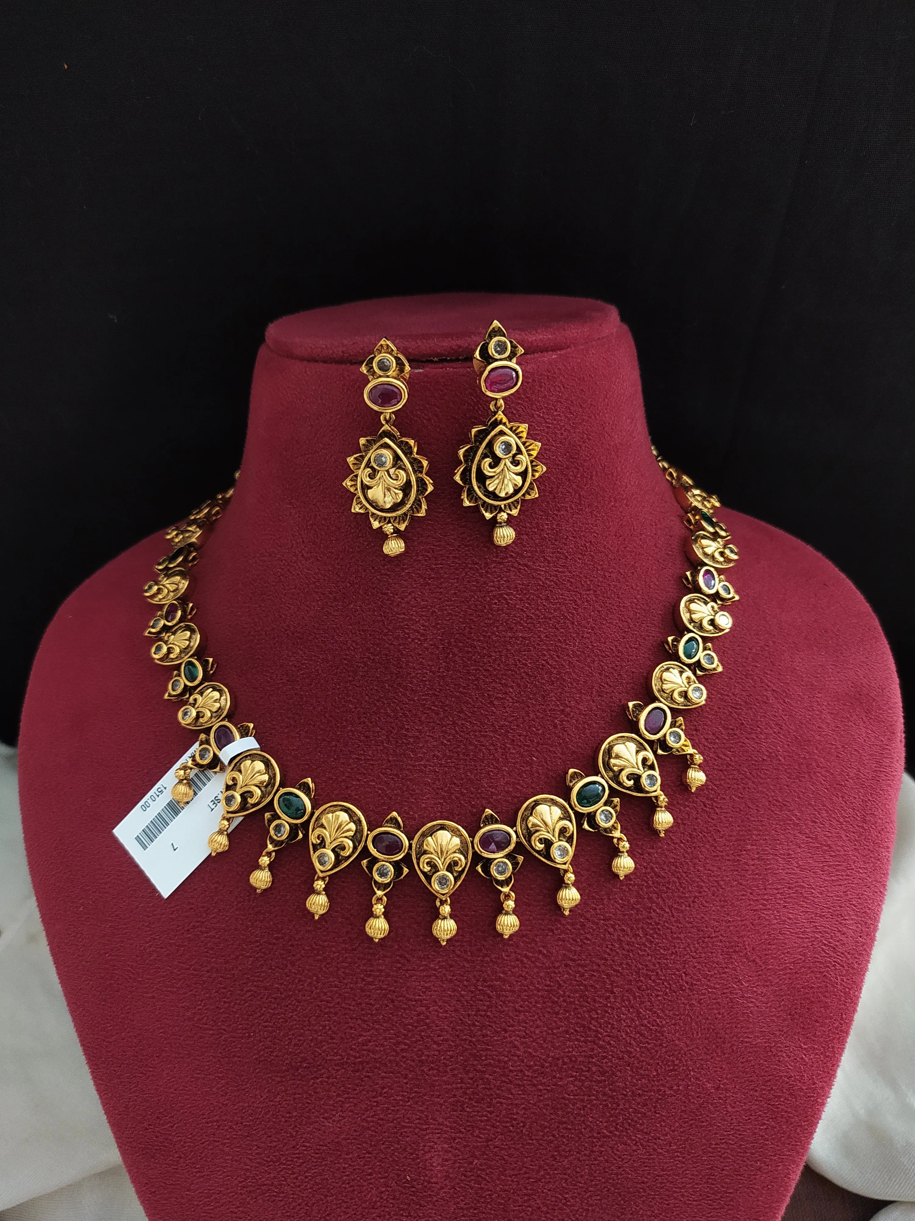 "Antique Floral Design Necklace Set with Kemp & Green Stones and Golden Ball Drops"