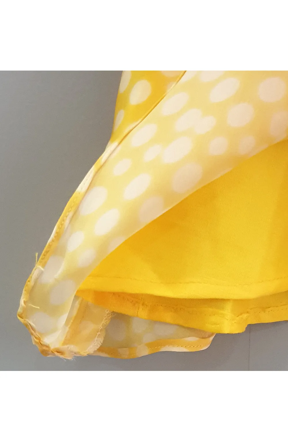 Yellow polka dot printed peplum style kurti and sharara with dupatta