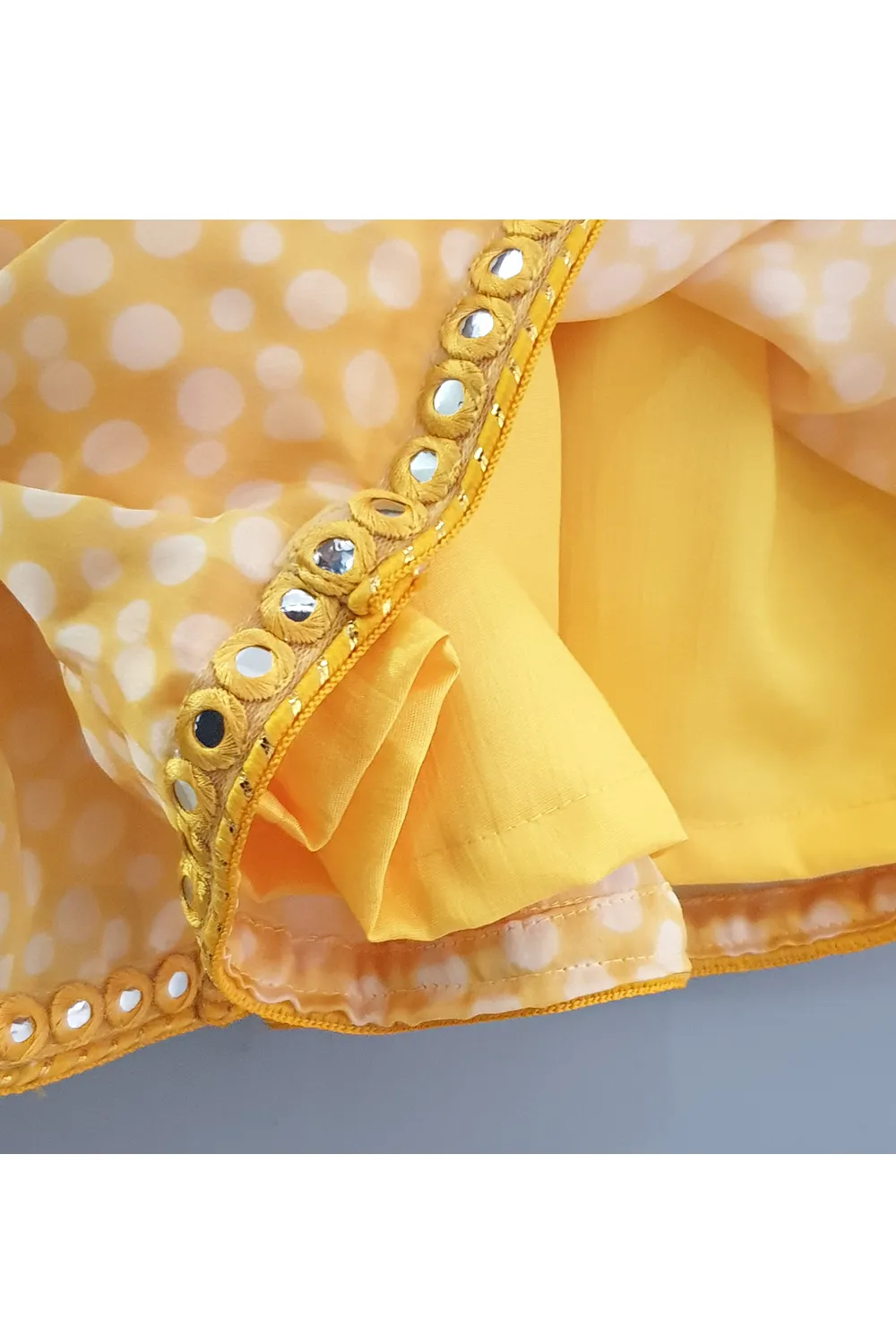 Yellow polka dot printed peplum style kurti and sharara with dupatta